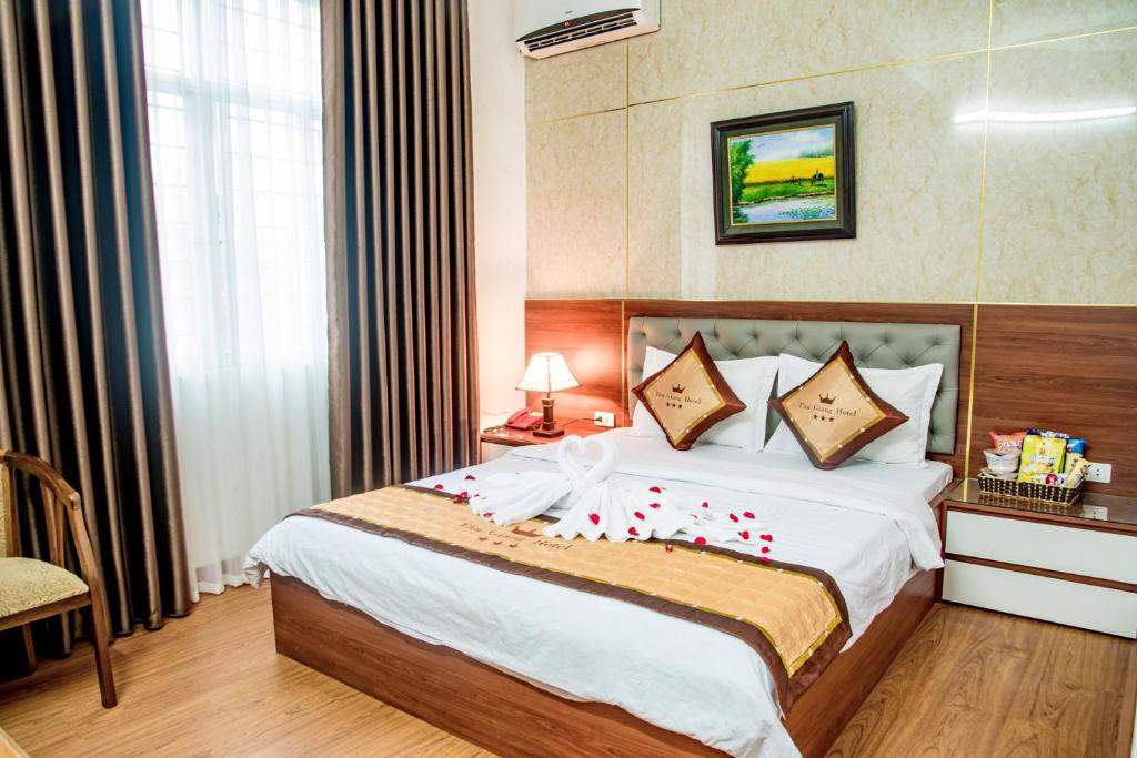 OYO 1143 Thu Giang Hotel客房内的一张或多张床位