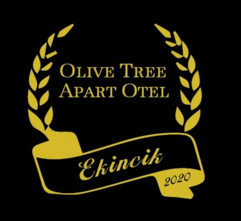 穆拉Olive Tree Apart Hotel的金葡萄酒树专利办公室标志,带有月桂花