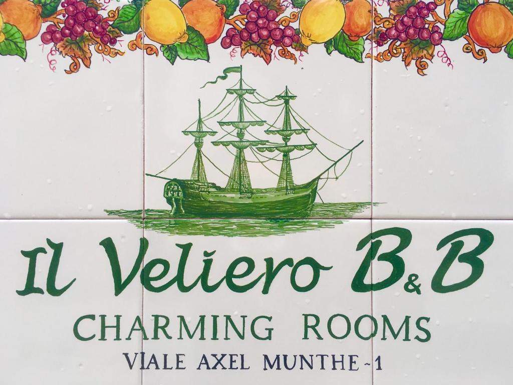 阿纳卡普里Il Veliero B&B charming rooms的船屋的标志