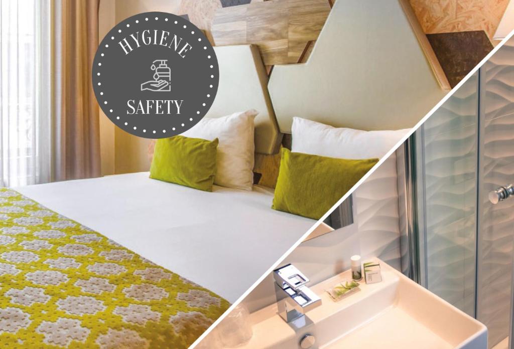 巴黎阿尔伯特王子酒店的小房间设有一张带绿色和白色枕头的床