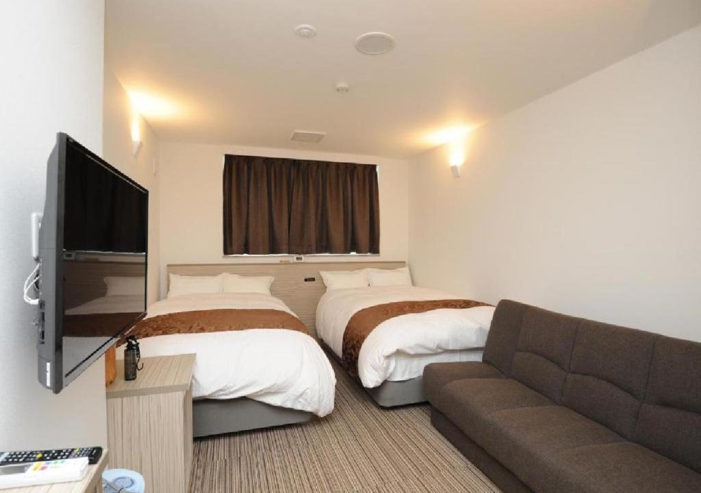 Hotel Sunriver Shimanto - Vacation STAY 98020客房内的一张或多张床位