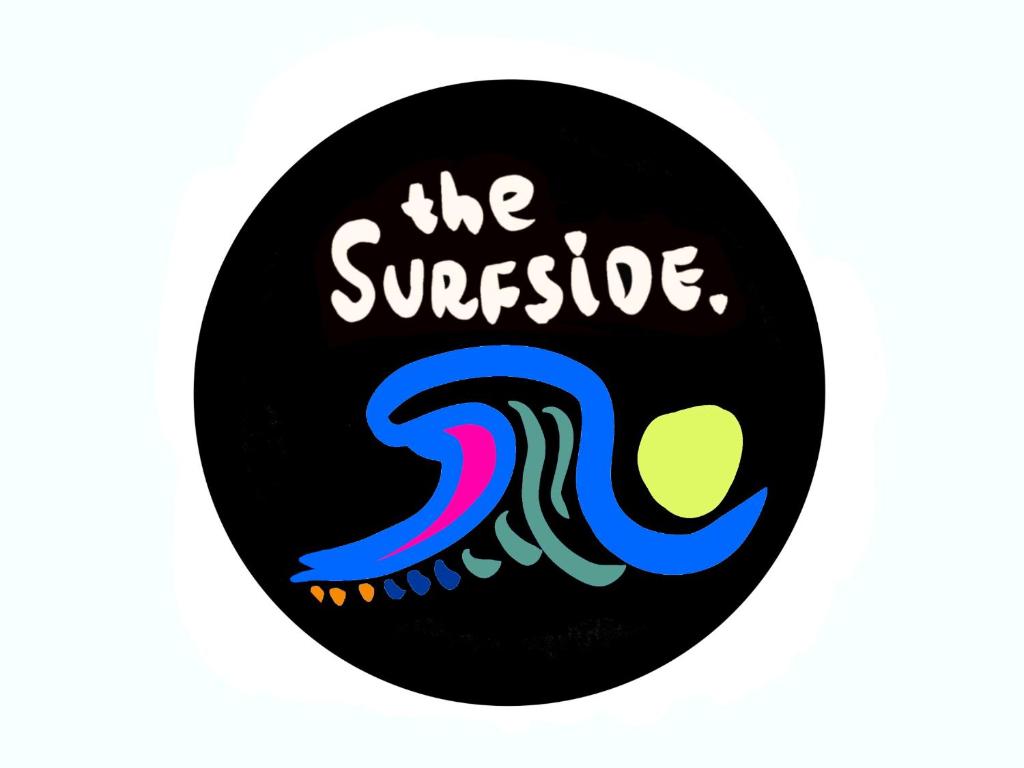 斯卡曼德The Surfside Beaumaris的带有订阅标志的圆形黑色按钮