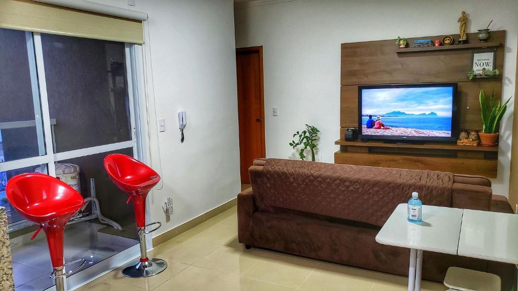 圣卡洛斯FRODO-APTO MAGNÍFICO com Wifi , 2 dorm的带沙发和平面电视的客厅