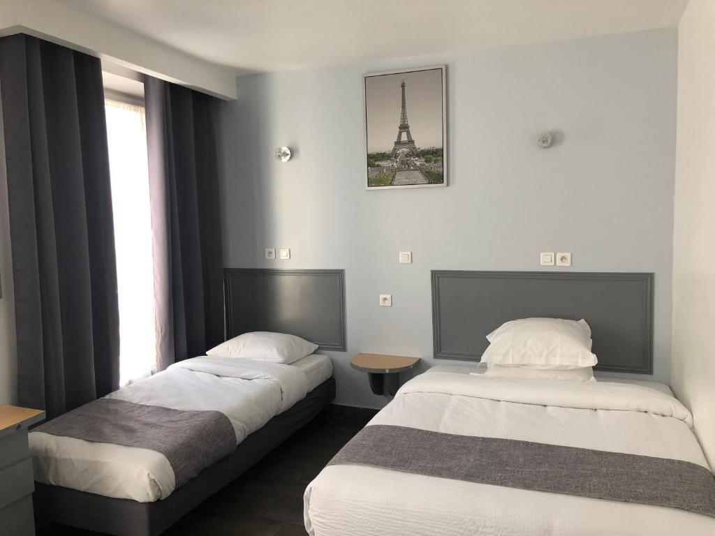 巴黎克罗采酒店客房内的一张或多张床位