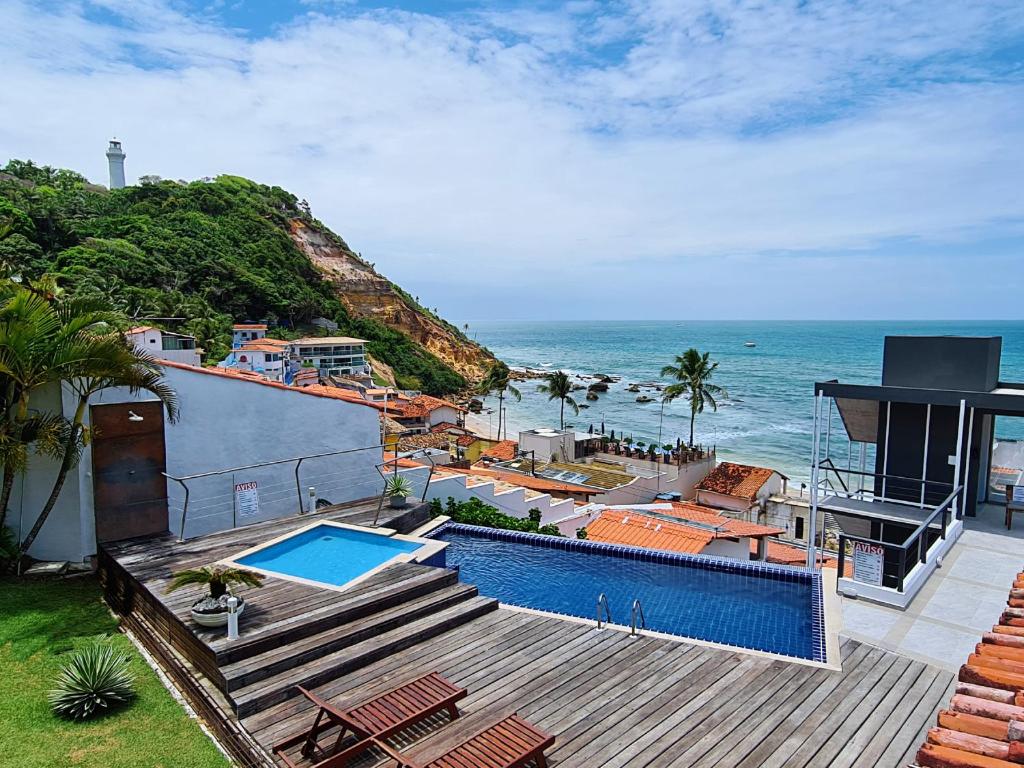 莫罗圣保罗伊利亚达萨达德旅馆的海边带游泳池的房子