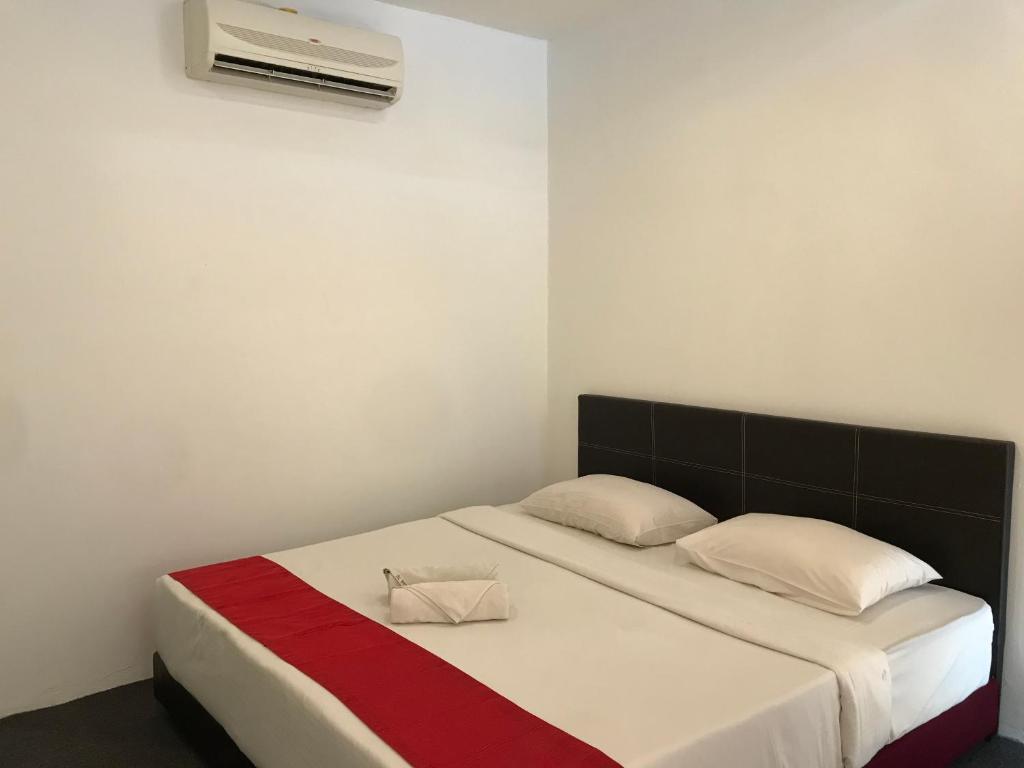 HL HOTEL Kota Bharu客房内的一张或多张床位