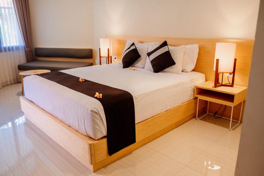 New Sunari Lovina Beach Resort客房内的一张或多张床位