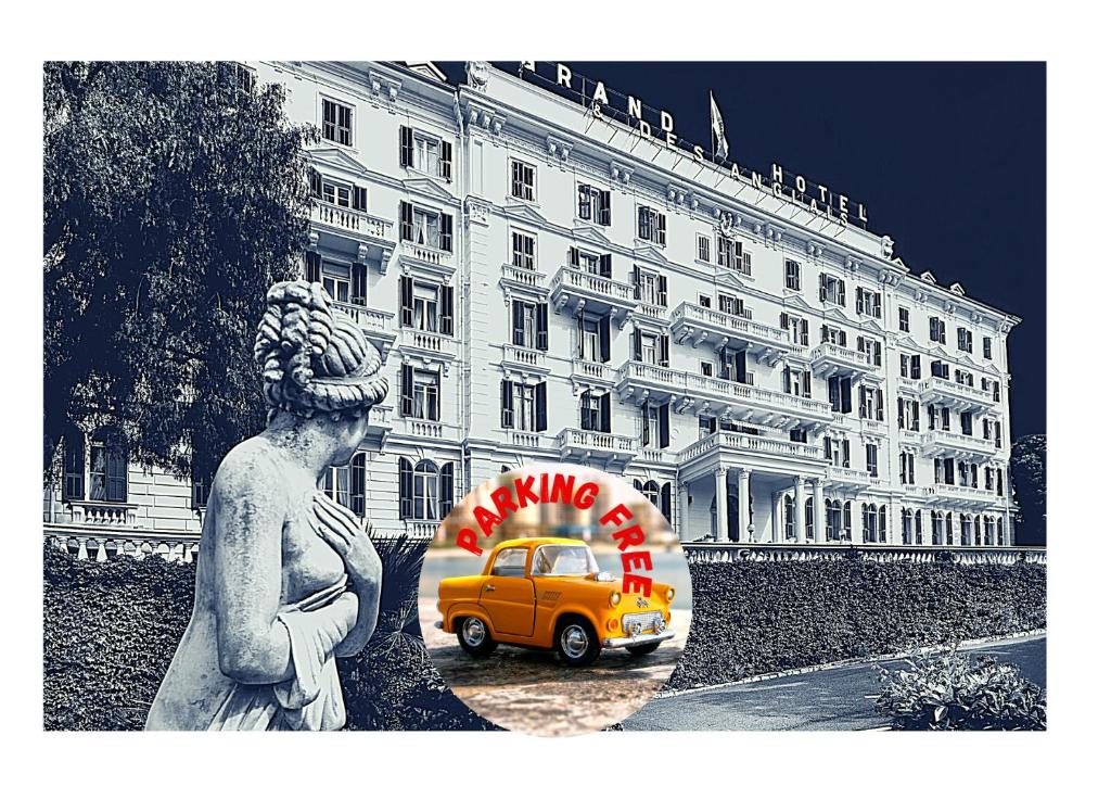 圣雷莫Grand Hotel & des Anglais Spa的站在一座建筑前面的一位妇女,有一辆黄色面包车