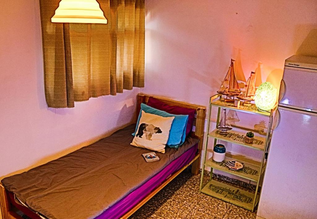 Exodus Hostel &amp; Dive Center客房内的一张或多张床位