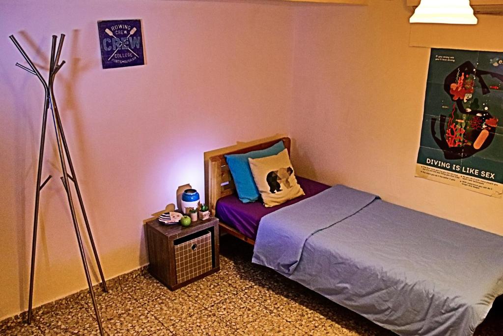 Exodus Hostel &amp; Dive Center客房内的一张或多张床位