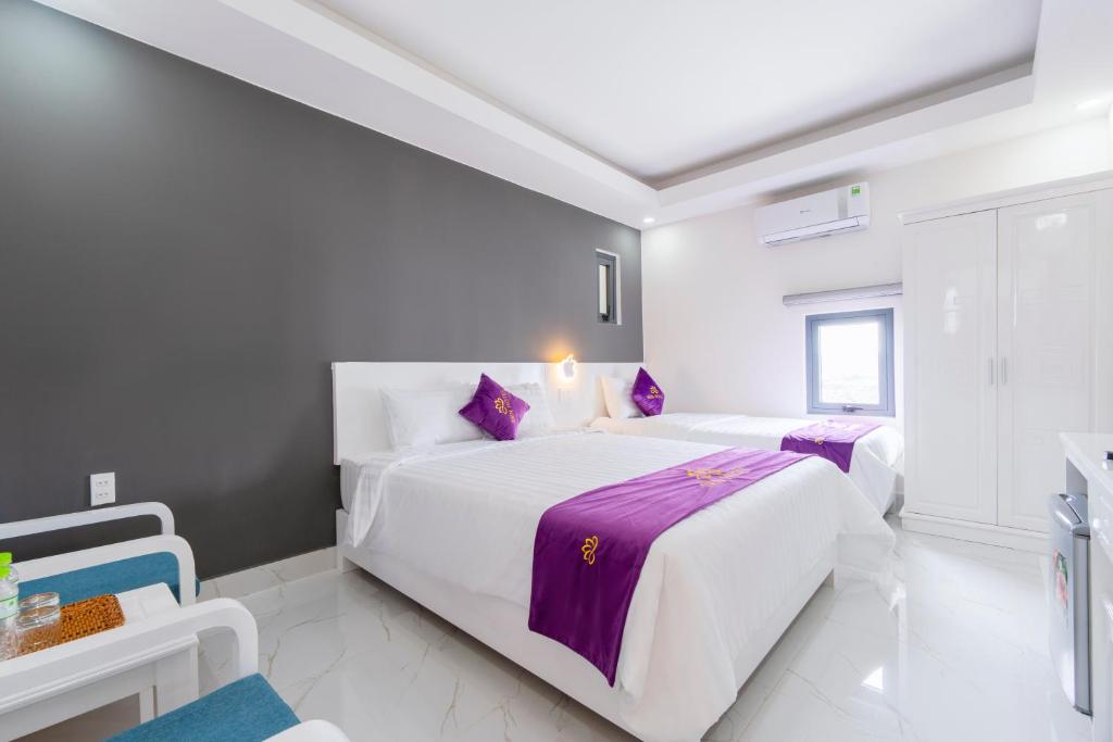 Sen Hotel Phu Quoc客房内的一张或多张床位