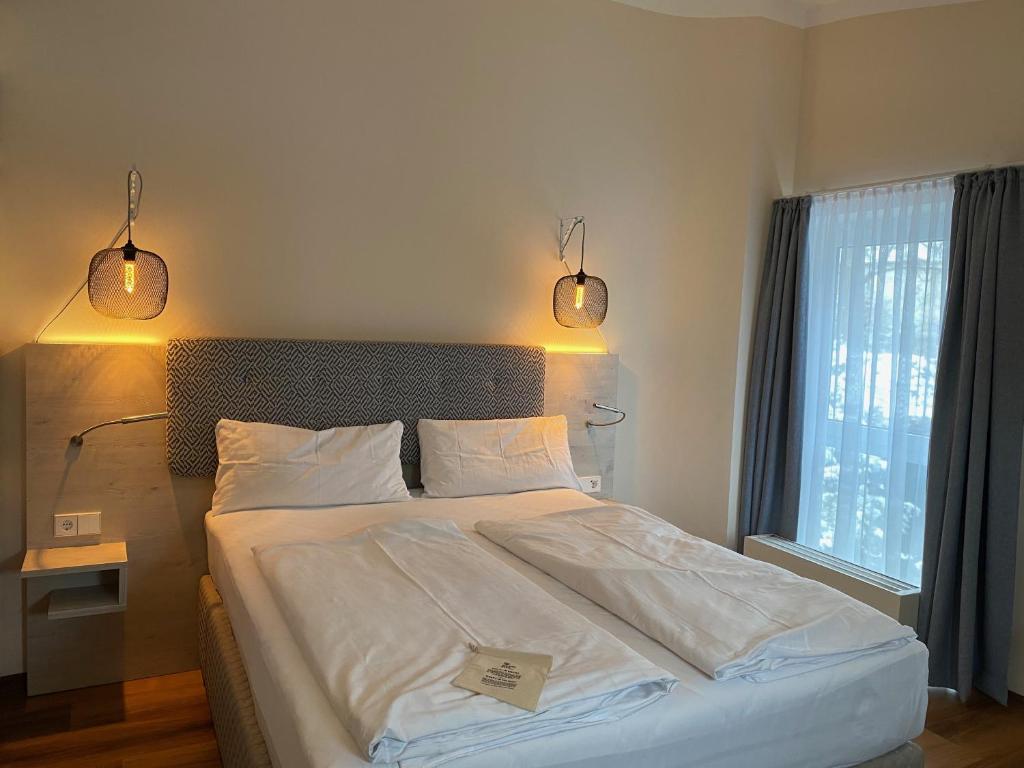 Safranberg Hotel & Sauna客房内的一张或多张床位