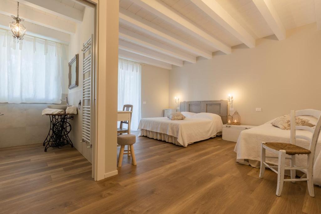 Il cantuccio sul Garda - Relais di charme客房内的一张或多张床位