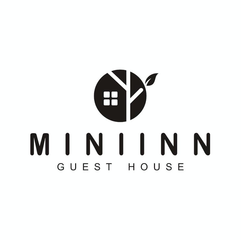 斯里巴加湾市Miniinn Guest House的标志旅馆