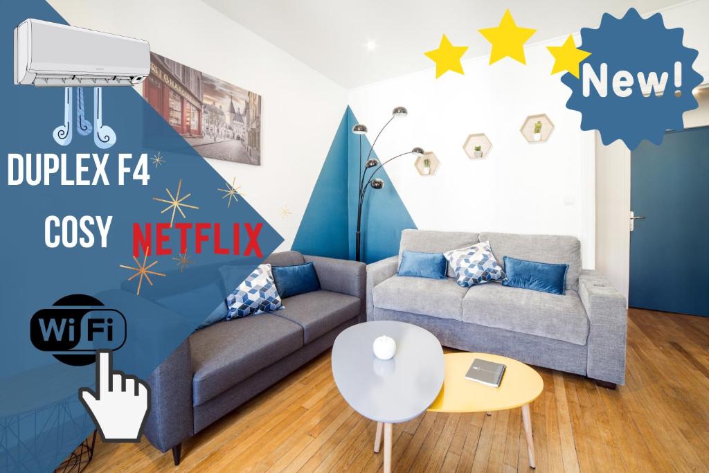 南希Appartement Le Grand Dupont du Parc Ste-Marie - OscarNewHome的客厅配有沙发,墙上挂着星星。