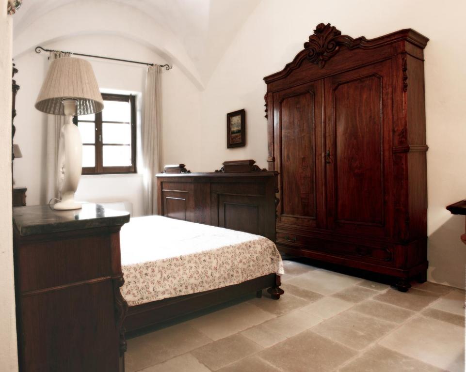 马塞里亚托雷莫萨农家乐客房内的一张或多张床位