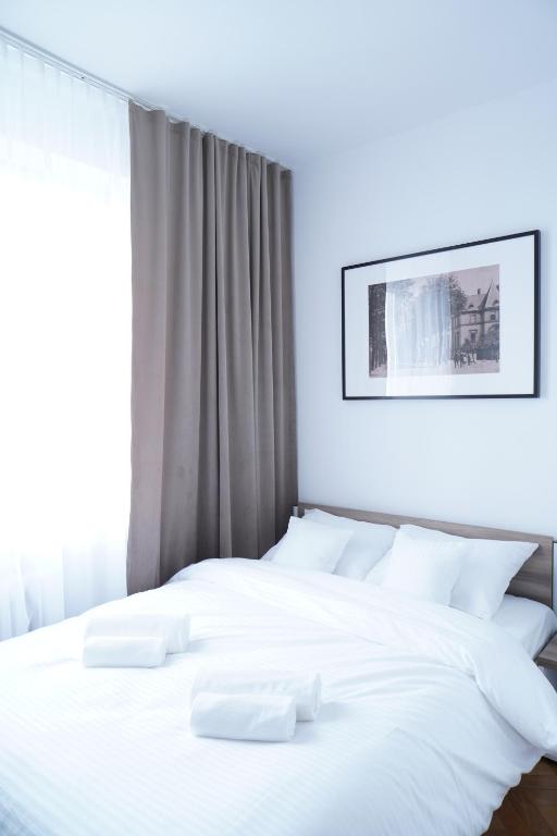 Stary Koszalin Hostel &amp; Hotel Services客房内的一张或多张床位