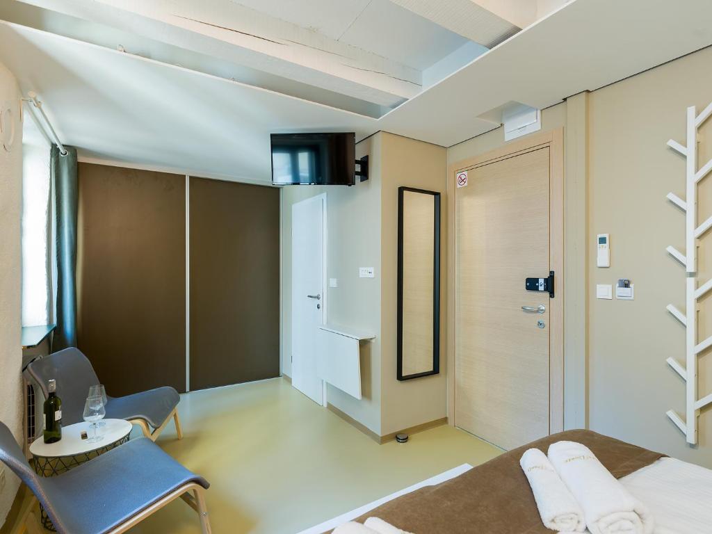 Tre Porte Rovinj客房内的一张或多张床位