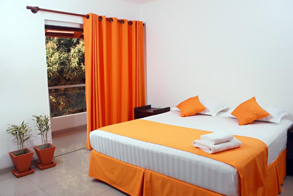 Hotel Tierra Linda客房内的一张或多张床位