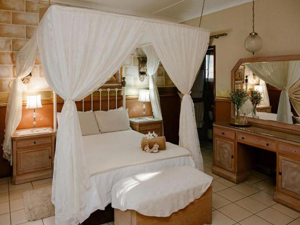 Coco Cabana Guest House客房内的一张或多张床位