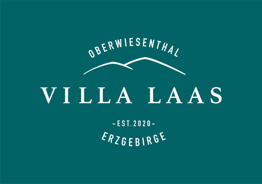 奥泊维森塔尔Villa Laas Oberwiesenthal的别墅楼总部标志
