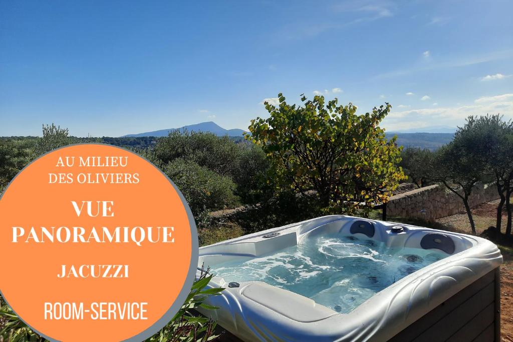 TavernesPantaiaHomes - Clos de Susville - Vue Panoramique - Piscine - Jacuzzi的花园内带热水浴池的标志