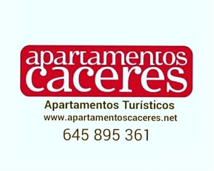 卡塞雷斯Apartamentos Caceres的红色的标志,上面写着“ ⁇ 鱼”