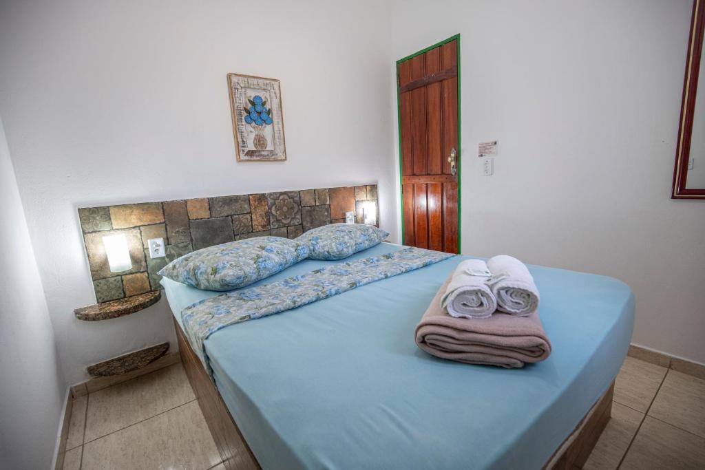 Pousada Casa do Rio Hostel - 8 min do Centro Hístorico - Passeio de Barco com saída da Pousada -Pago a parte- Perto das Praias e Beira Rio客房内的一张或多张床位