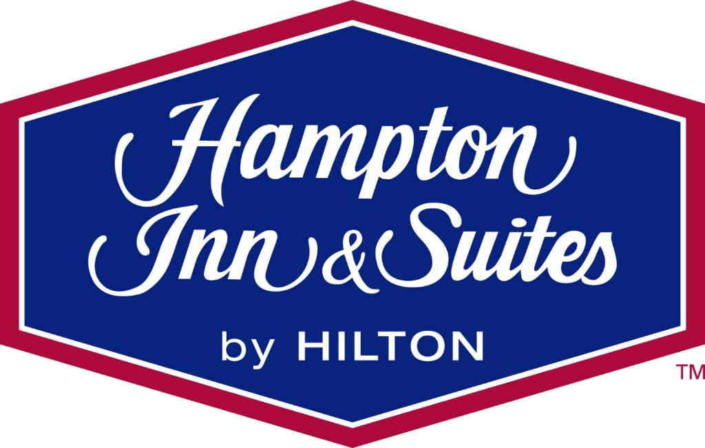 伊普西兰蒂Hampton Inn & Suites Ypsilanti, MI的一个蓝色的标志,上面写着汉普顿移民服务