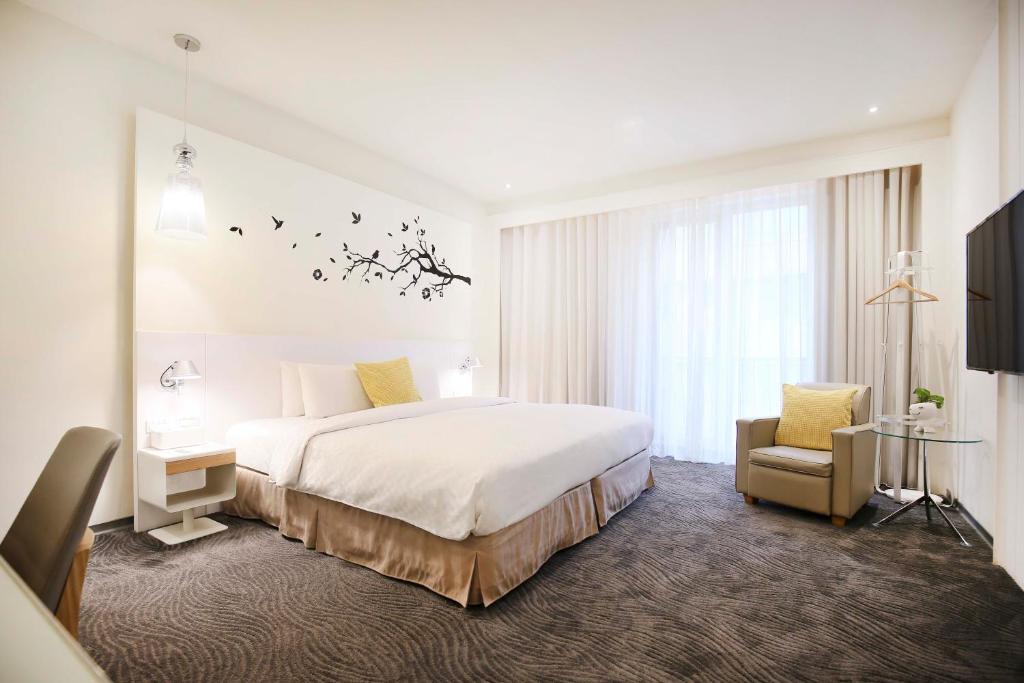 丹迪旅店-天津店 客房内的一张或多张床位