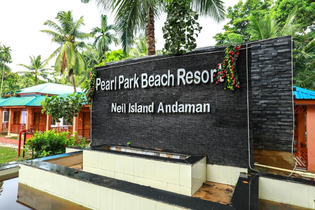 布莱尔港Pearl Park Beach Resort Private Limited的度假村海滩度假村的标志