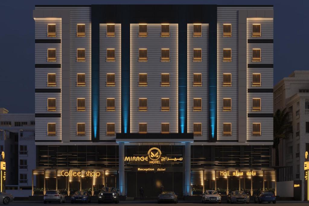 吉达Mirage Hotel Jeddah的夜幕降临的幻影酒店