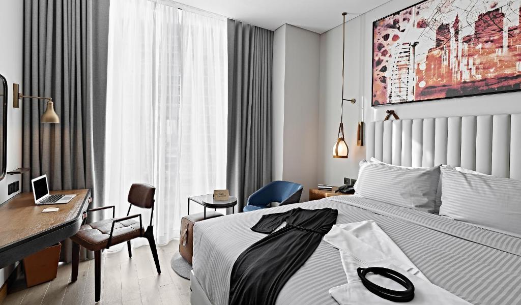 Revier Hotel - Dubai客房内的一张或多张床位