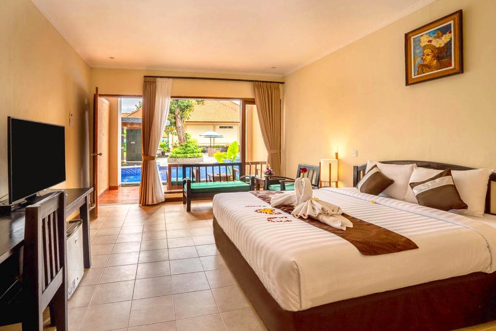 New Sunari Lovina Beach Resort客房内的一张或多张床位