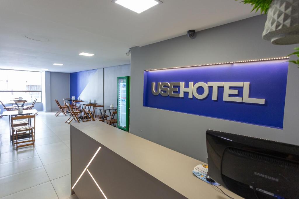 阿雷格里港USEHOTEL - A uma quadra do complexo hospitalar Santa Casa的我们酒店墙上的用户签名