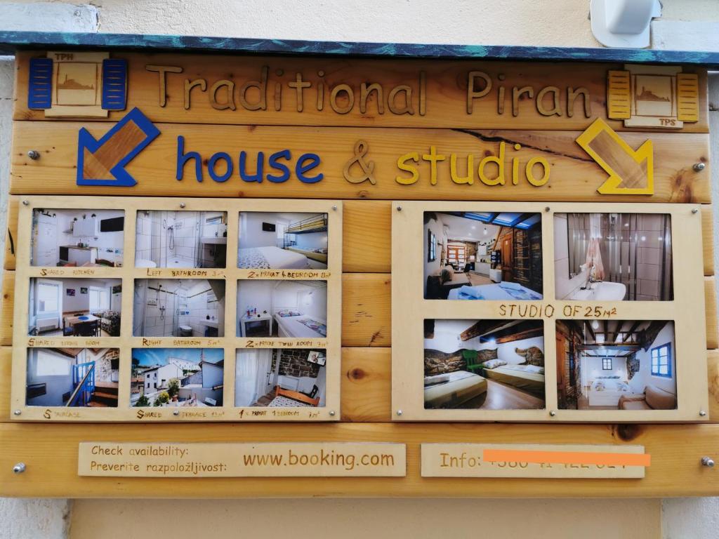 皮兰Traditional Piran house的传统公司房屋和一室公寓的标志