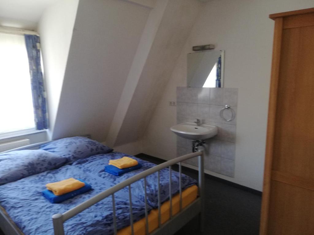 Gastehaus Heigeleshof客房内的一张或多张床位