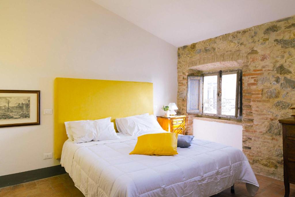Angolo Divino Tuscany客房内的一张或多张床位