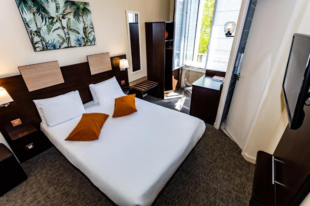 尚巴尼酒店客房内的一张或多张床位