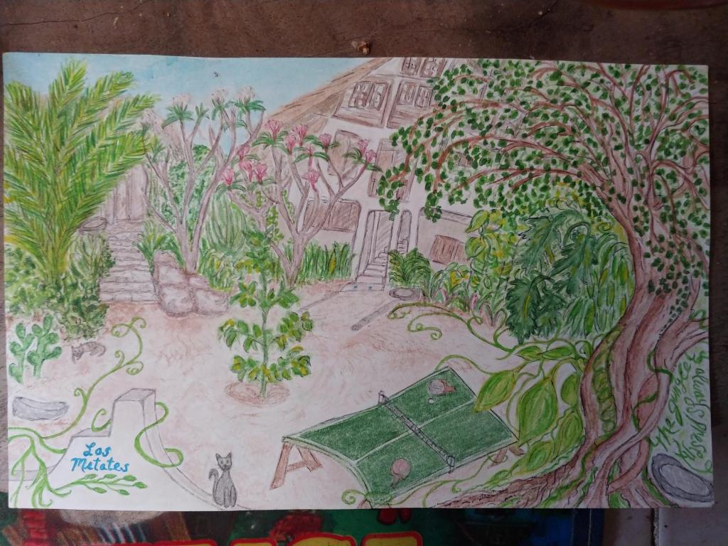 兹波利特Los metates的花园的画面,花园中设有桌子和树木