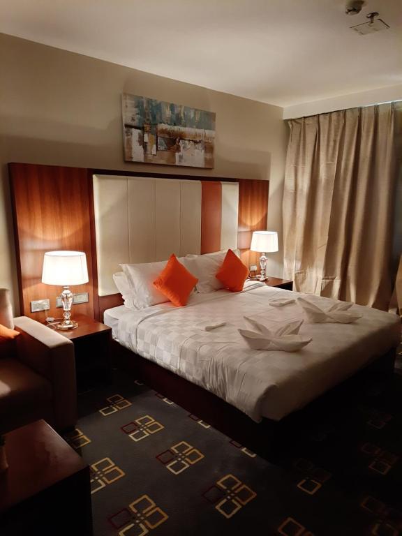 Karam Al Diyafa Hotel客房内的一张或多张床位