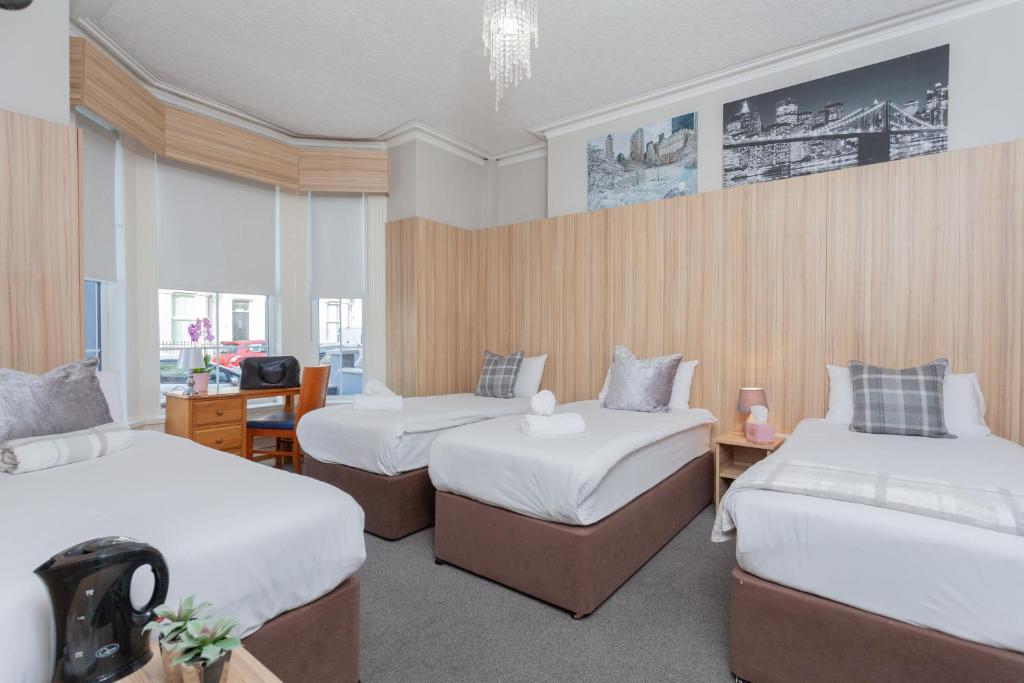 皇后植物园休憩酒店客房内的一张或多张床位