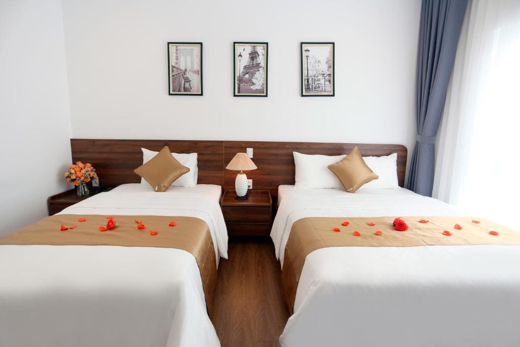 Silk River Hotel Ha Giang客房内的一张或多张床位