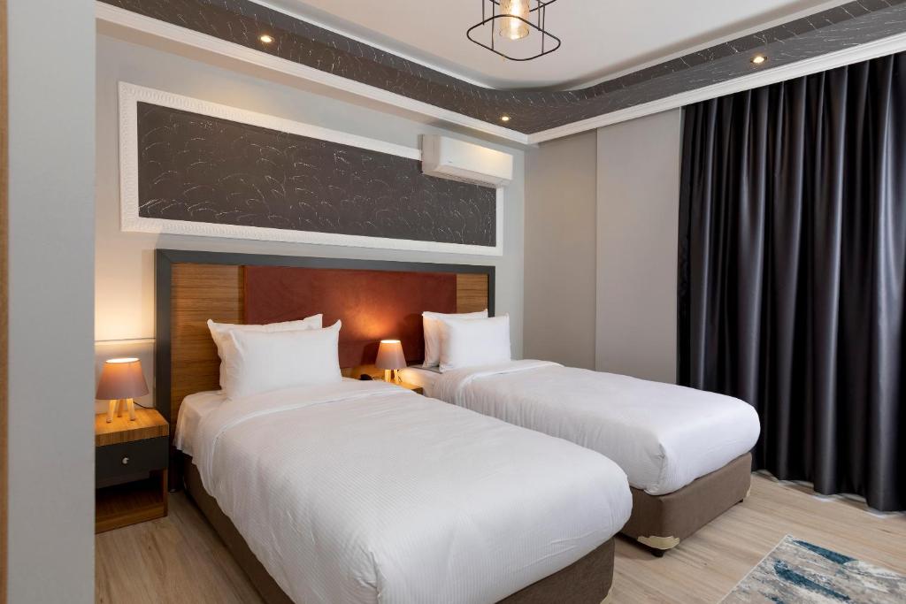 Toprak Apart Otel客房内的一张或多张床位