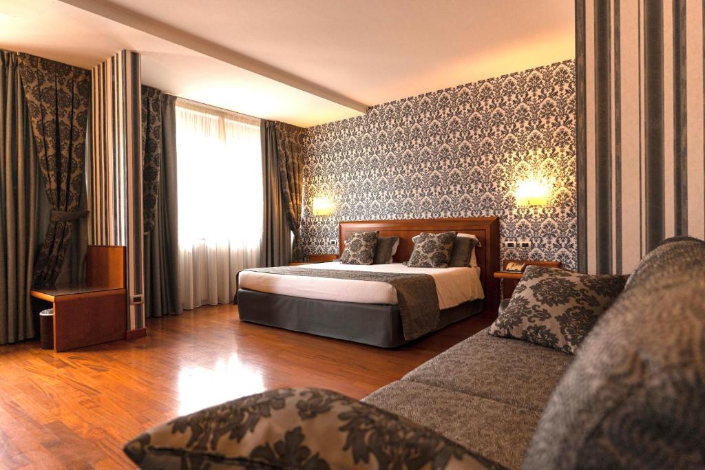 Hotel Palace Verona客房内的一张或多张床位