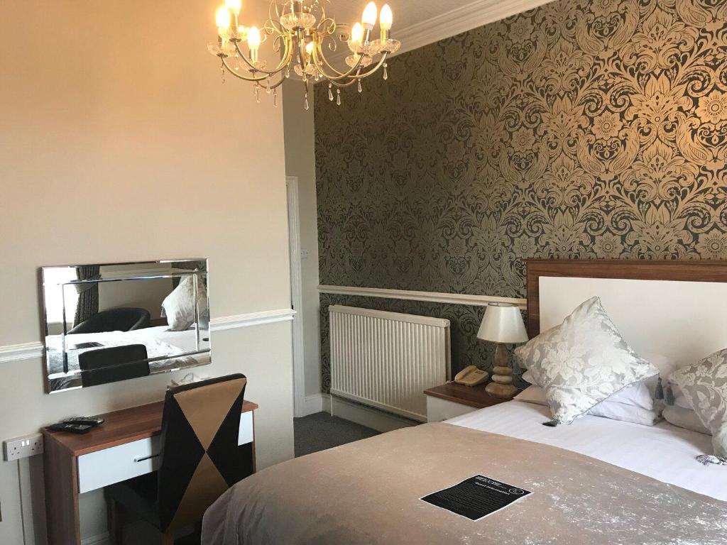 Lauriston &amp; Lawton Court Hotel客房内的一张或多张床位