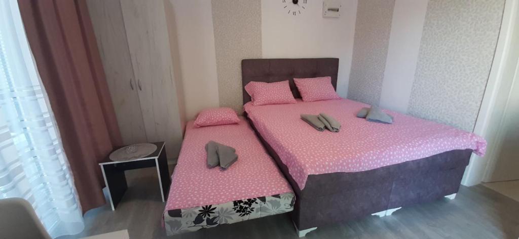 Apartman Casa Lux客房内的一张或多张床位