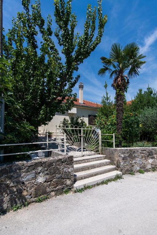 sunflower house with a pool and large garden