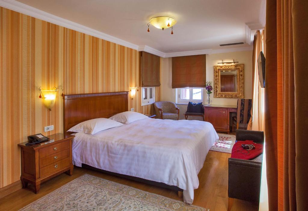 艾特马酒店 客房内的一张或多张床位