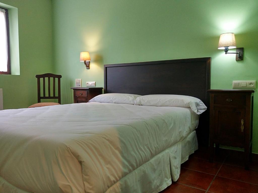 Hotel Rural El Otero客房内的一张或多张床位